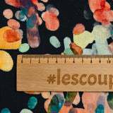 Viscose linen printed with multicolored balloons on navy background