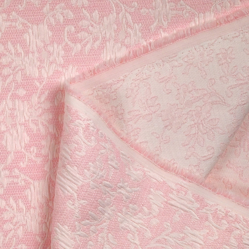 Jacquard de polycoton liaison de fleurs fond rose