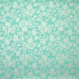 Jacquard de polycoton liaison de fleurs fond turquoise