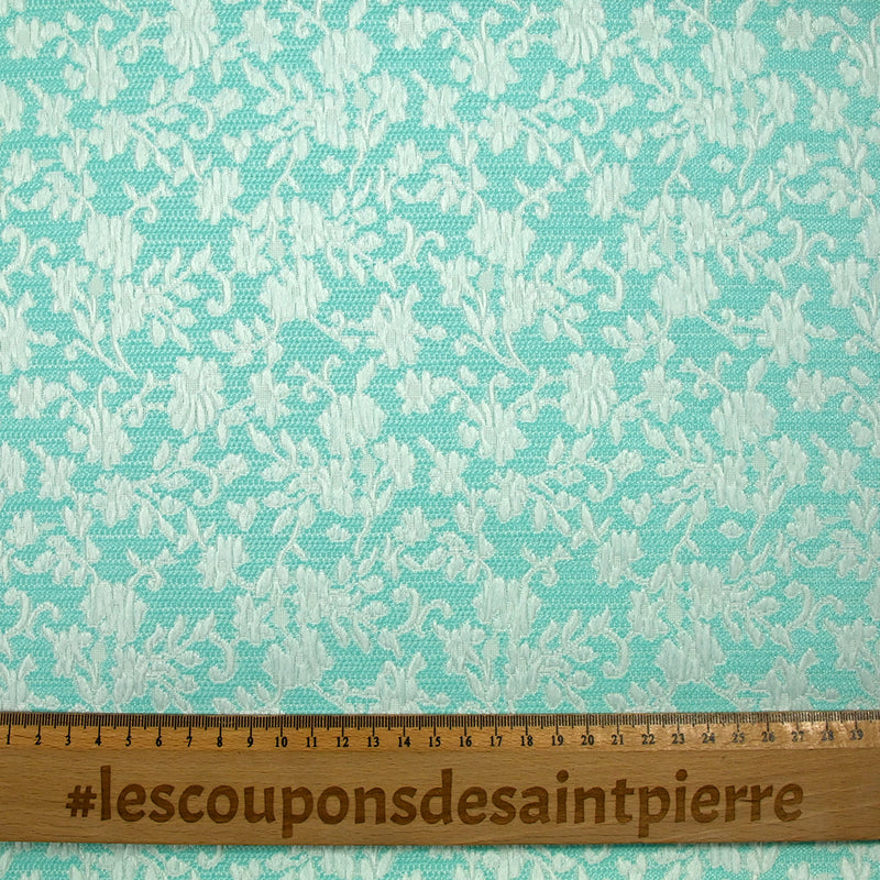 Jacquard de polycoton liaison de fleurs fond turquoise