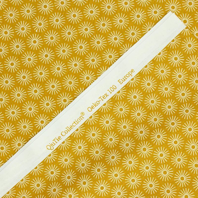 Popeline de coton imprimée soleil fond moutarde