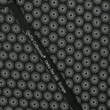 Popeline de coton imprimée soleil fond noir