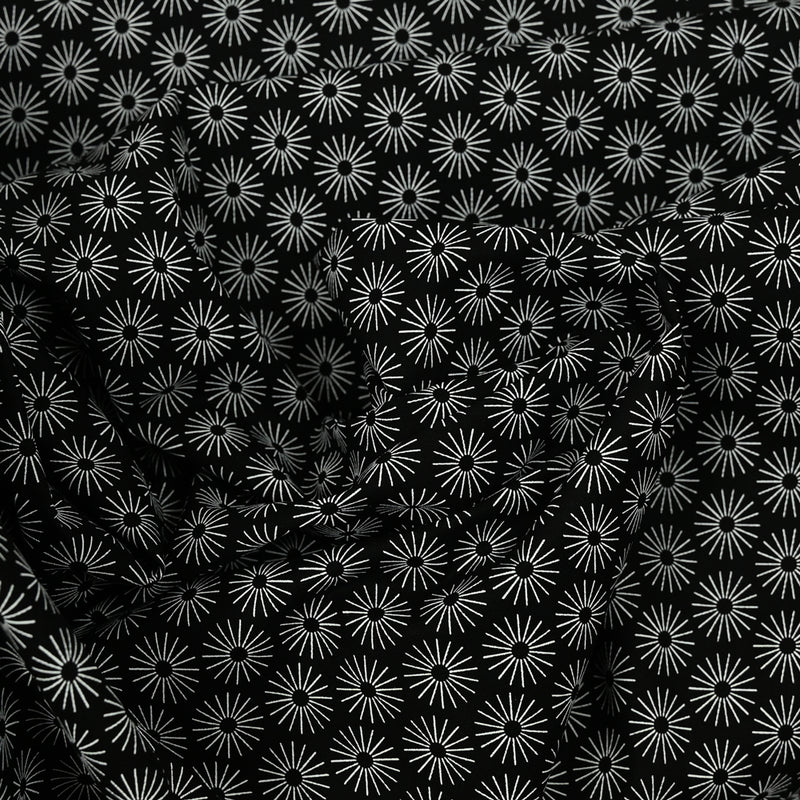 Algodón de algodón Pobline estampado Sol de fondo negro