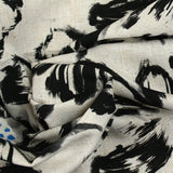 Viscose linen flower print with black brush on ecru background