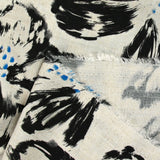 Viscose linen flower print with black brush on ecru background