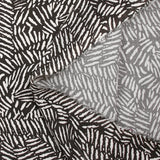 Viscose imprimée hypnose abstraite fond marron foncé
