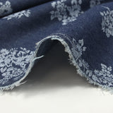 Chambray de coton imprimé fleurs fond bleu foncé