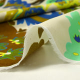 Voile de coton imprimé cachemire jaune fluo et turquoise fond écru