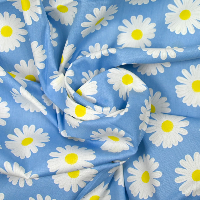 Coton imprimé marguerite fond bleu