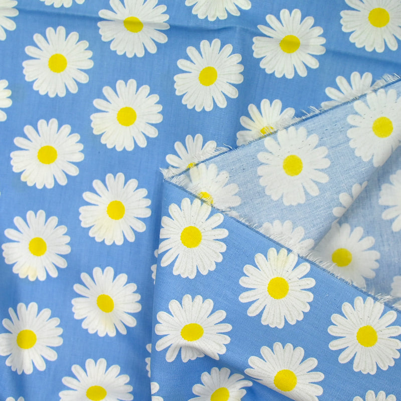 Coton imprimé marguerite fond bleu