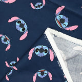 Coton imprimé tête de Stitch fond marine