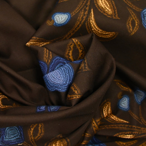Coton imprimé grande fleur bleu fond marron