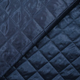 Twill matelassé à carreaux marine