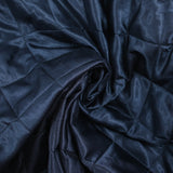 Twill matelassé à carreaux marine