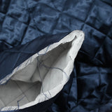 Twill matelassé à carreaux marine