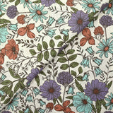 Coton imprimé le temps des fleurs fond blanc cassé