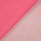 Matelassé à carreaux rose