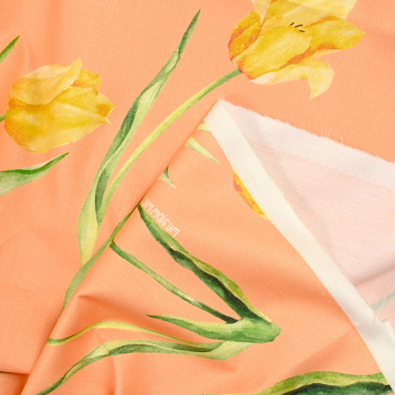 Coton imprimé tulipe jaune fond orange