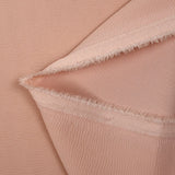 Double crêpe de polyester rose poudré