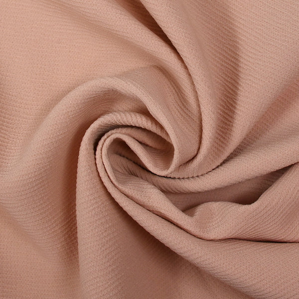 Double crêpe de polyester rose poudré