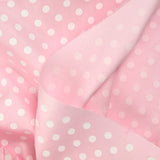 Coton imprimé pois 8mm fond rose layette