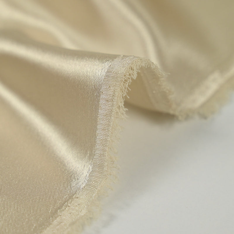 Crêpe satin polyester blond platine