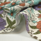 Coton imprimé le temps des fleurs fond blanc cassé