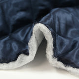 Twill matelassé à carreaux marine