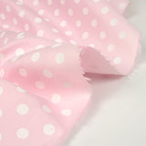 Coton imprimé pois 8mm fond rose layette