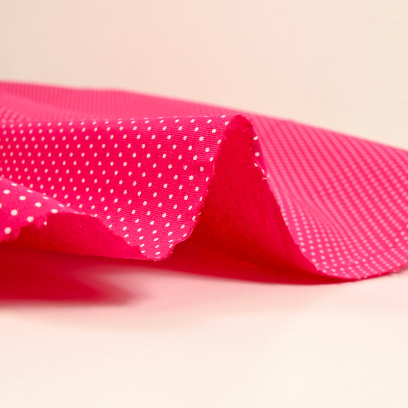 Coton imprimé pois 1mm fond fuchsia