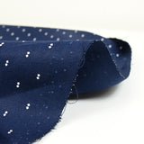 Coton imprimé noeud de papillon fond marine