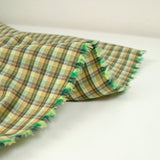 Coton tissé-teint à carreaux vert et orange