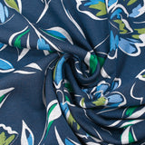 Sweatshirt with blue and green flowers on navy background