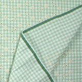 Coton Vichy seersucker brodé fond vert pastel