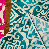 Viscose imprimée éclat d’orient fuchsia et turquoise fond écru