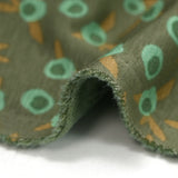 Summer buds soft toy sweatshirt in water green and ocher khaki background