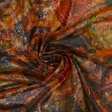 Maille polyester lamée nature morte doré et orange