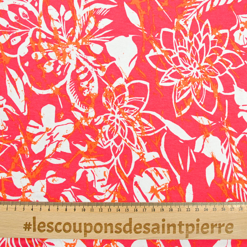 Jersey de viscose imprimé splash et fleurs fond rose