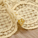 Dentelle festonnée rosaces ivoire