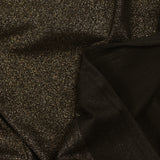 Jersey de viscose fin irisé doré fond noir
