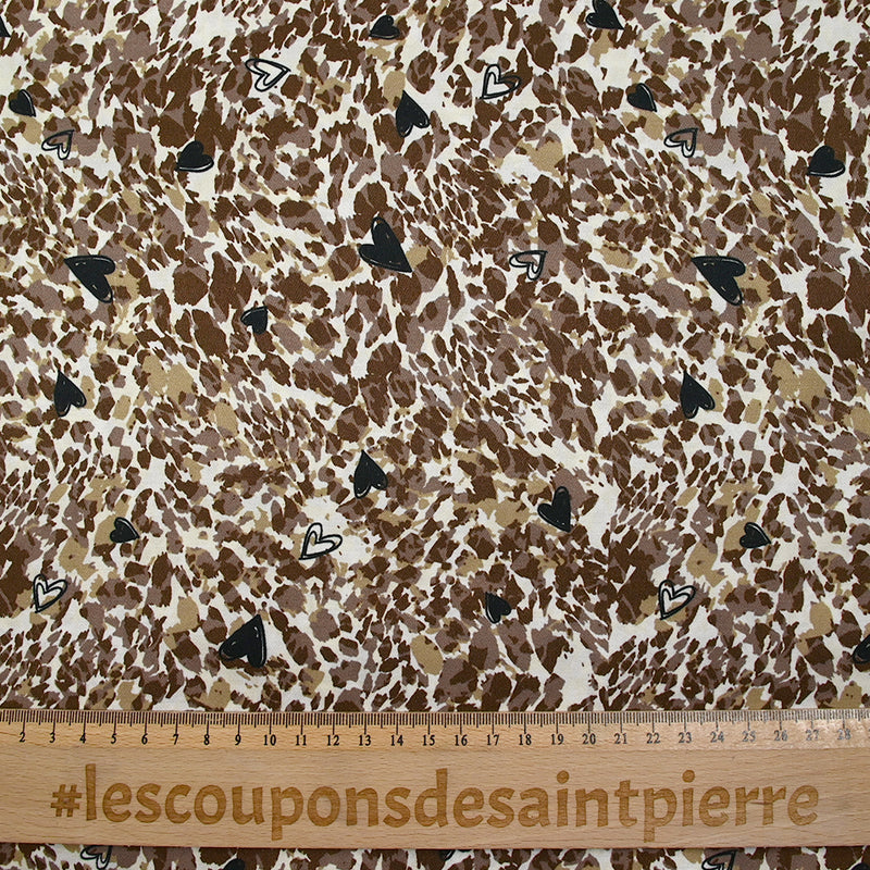 Satin de viscose imprimé graou et cœurs fond blanc