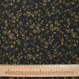 Voile de viscose imprimé branches de fleurs ocre fond noir