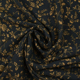 Voile de viscose imprimé branches de fleurs ocre fond noir