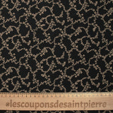 Viscose imprimée chaîne de fleurs fond noir