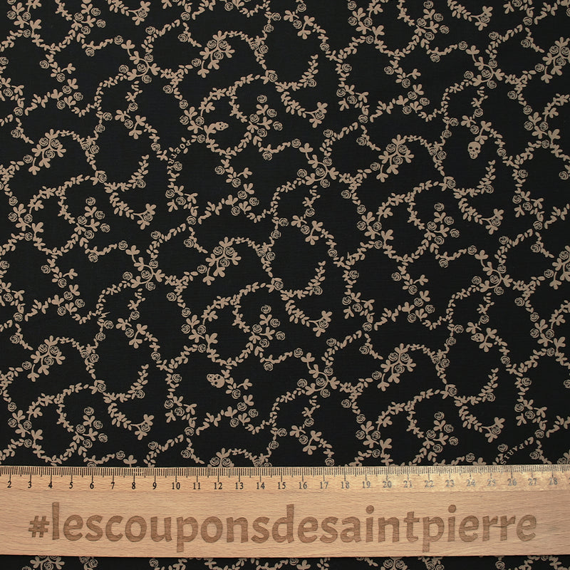 Viscose imprimée chaîne de fleurs fond noir