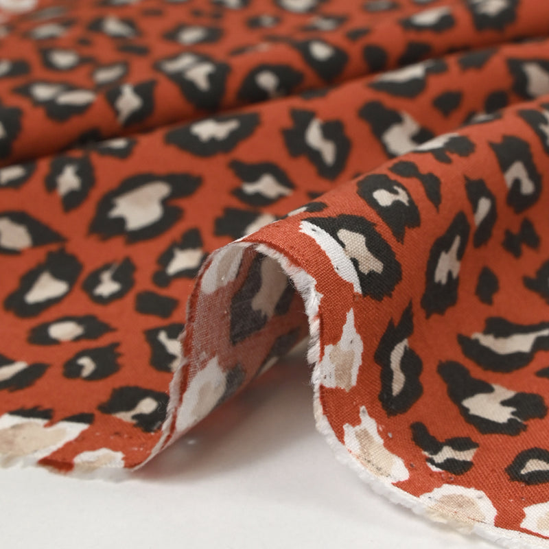 Viscose imprimée léopard fond brique