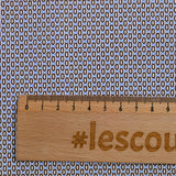 Popeline polycoton imprimée fantaisie bleu et marron