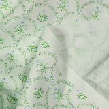 Cotton printed arc from green flower white background broken