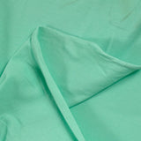 Camisa de polo de algodón verde de agua
