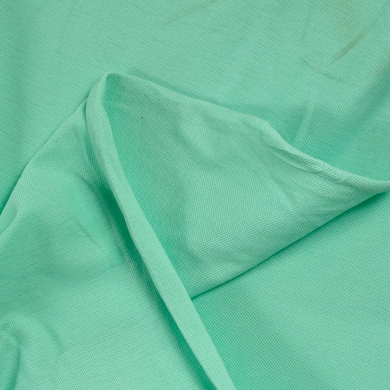 Camisa de polo de algodón verde de agua